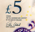 ÃÂ£5 pound note close up for QueenÃ¢â¬â¢s face Royalty Free Stock Photo